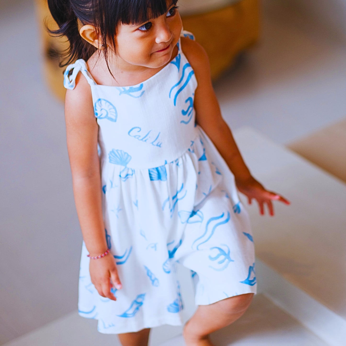 Pearl Playsuit - Girls White Linen Playsuit with Seashell Print | Cali Lu